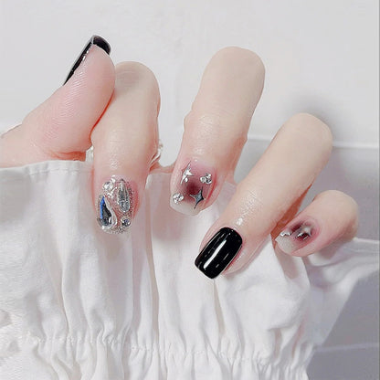 Artificial nail set with glamorous glitter and crystal decorations Acalora