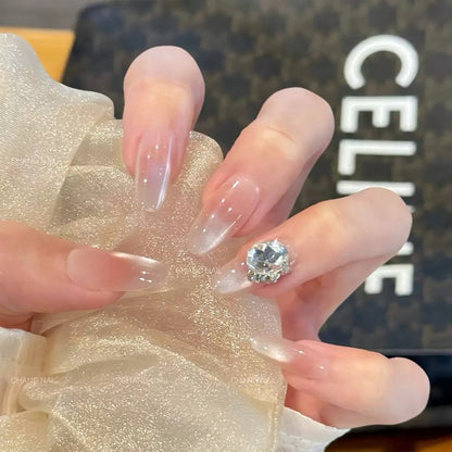 Artificial nail set with elegant tips and crystal accents Acalora