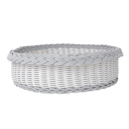 Handwoven storage basket with decorative edge