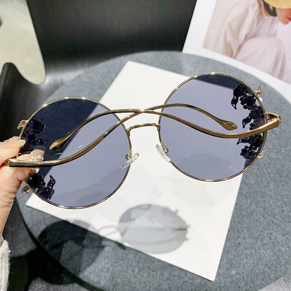Women's fashion sunglasses with extravagant design and sparkling accents Bowlift