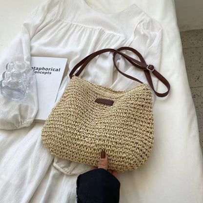 Hand-knotted shoulder bag with leather accents Skanto
