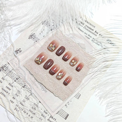 Acrylic nails in elegant ombre design with glitter elements Acalora