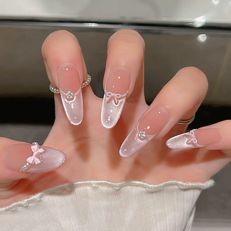 Artificial nail set with elegant bow and rhinestone embellishments Acalora