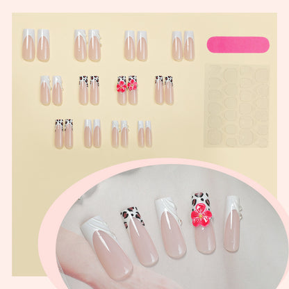 Artistic Press-On Nail Set with Floral and Abstract Designs Acalora