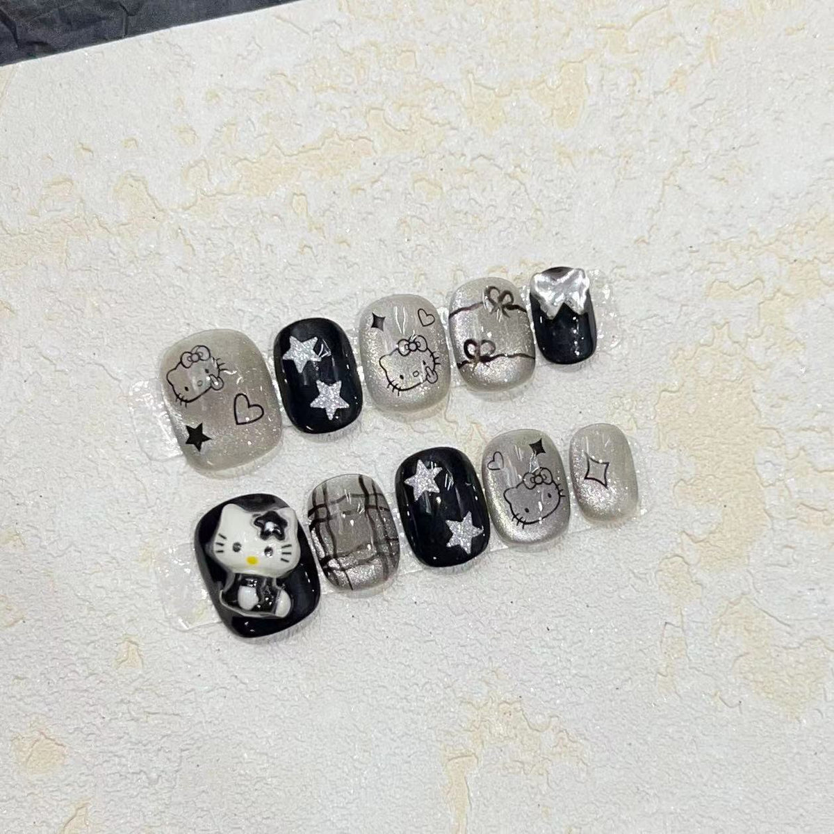 Fun and Whimsical Press-On Nail Set with Cartoon Accents Acalora