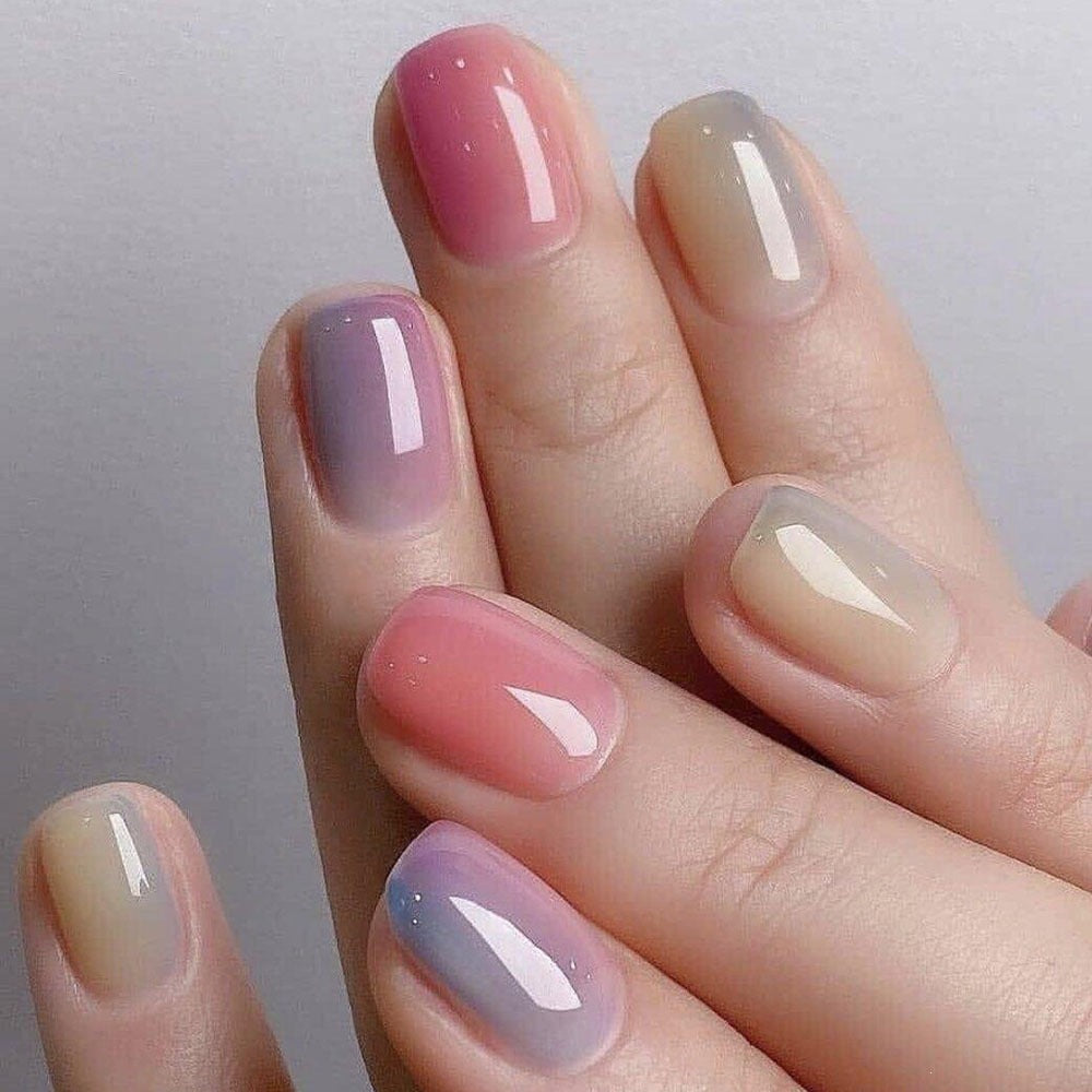 Artificial nails in elegant French tip design Acalora