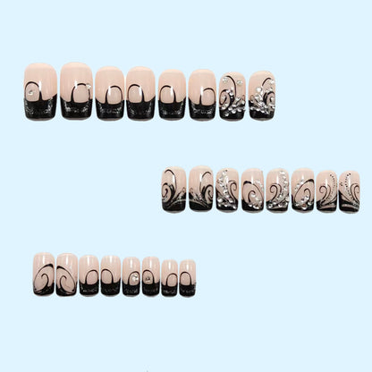 Artificial nails in elegant black-and-white design with glitter applications Acalora