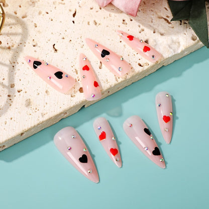 Glamorous artificial nails with heart accents Acalora