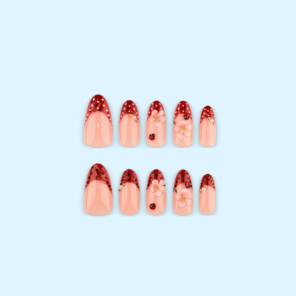 Creative tip design artificial nails with floral accents Acalora