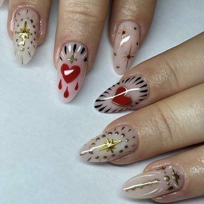 Nail art with glitter and heart decoration Acalora