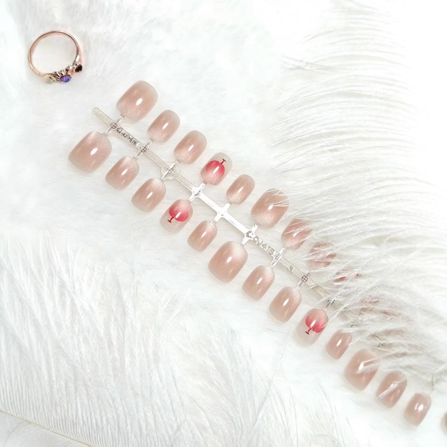 Artificial nails with elegant gradient and glitter accent design Acalora