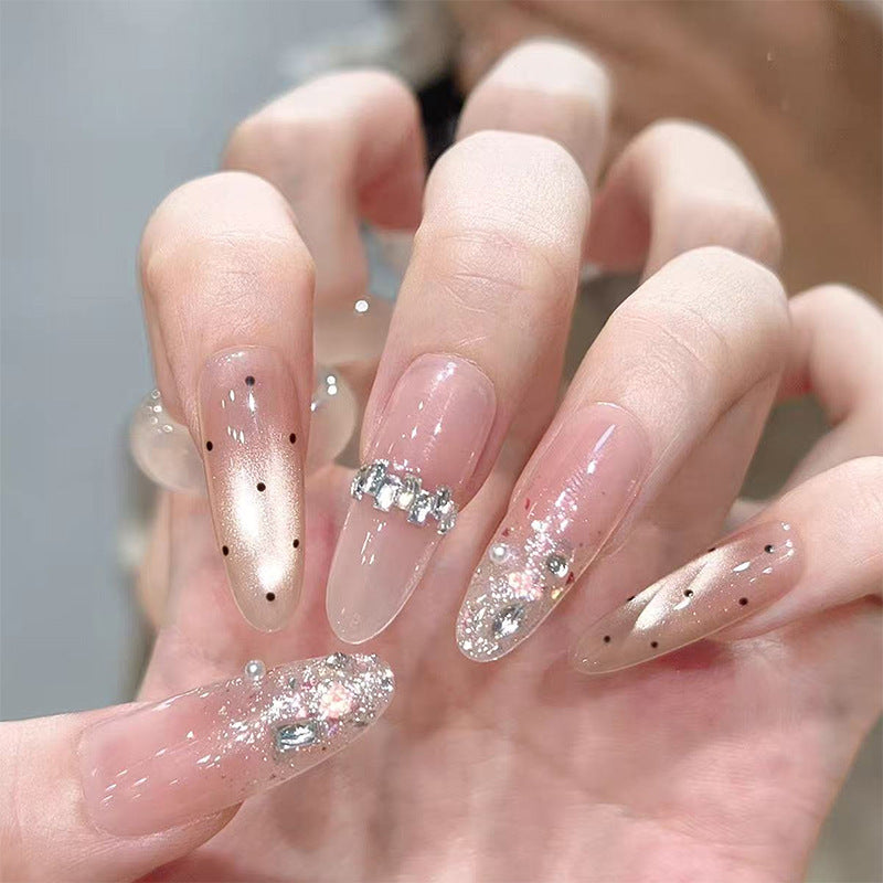 Nail art set with elegant glitter accents Acalora