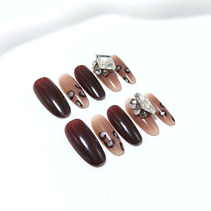 Luxury artificial nails with elegant rhinestone applications Acalora