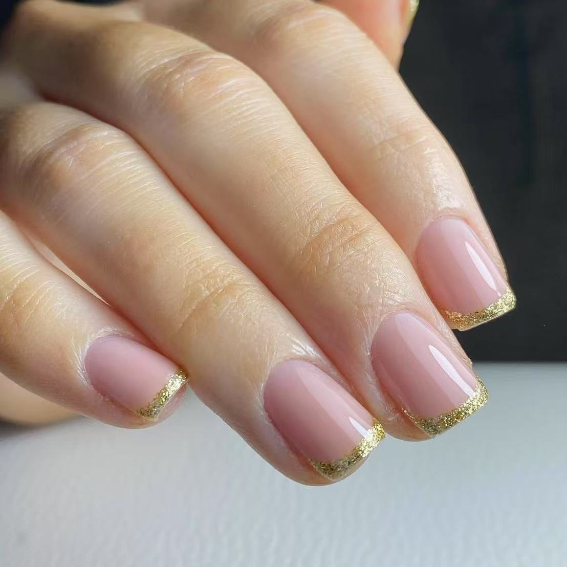 Artificial nails in elegant French tip design Acalora
