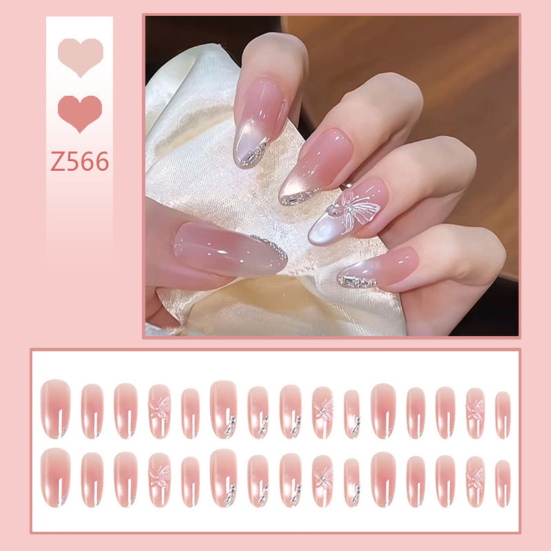 Acrylic nail set with elegant ombre design and sparkling accents Acalora