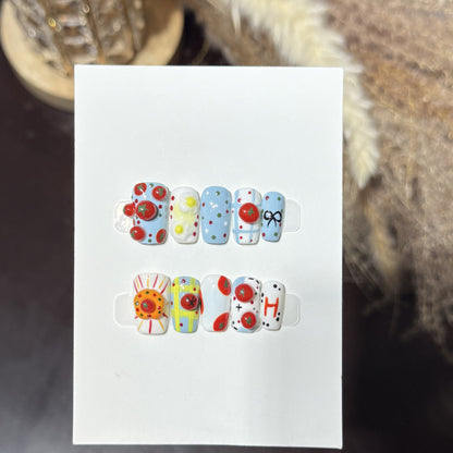 Artistic Press-On Nail Set with Playful Floral and Polka Dot Designs Acalora