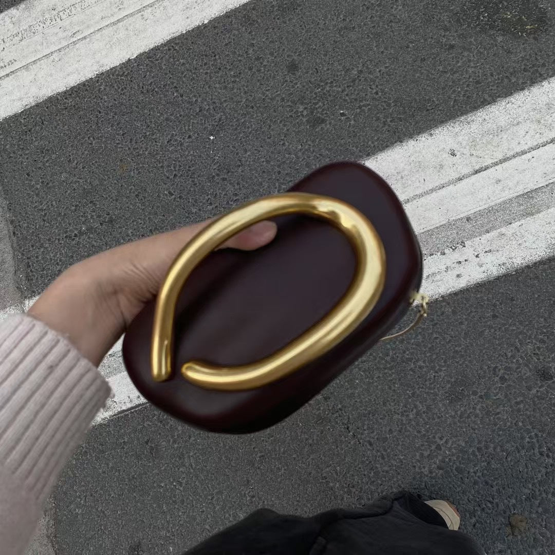 Statement Clutch with Sculptural Handle Acalora