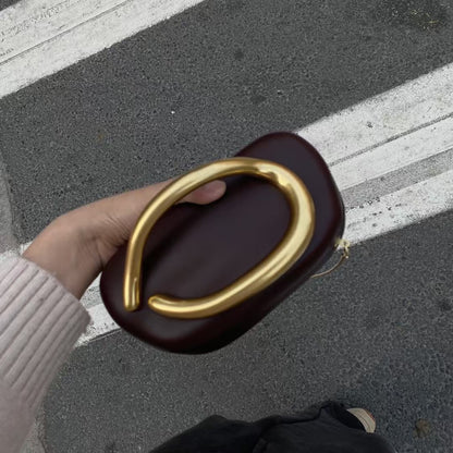 Statement Clutch with Sculptural Handle Acalora