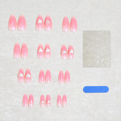Artificial nail set with 3D heart decorations and shimmering accents Acalora