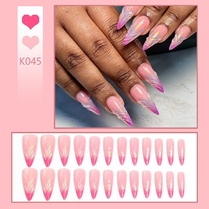 Artificial nails in modern design with pointed accents Acalora