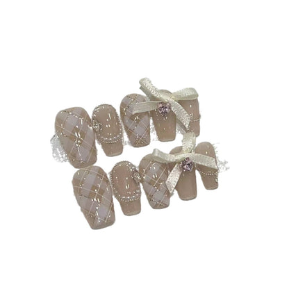Elegant Press-On Nail Art Set with Ribbons and Gemstone Accents Acalora
