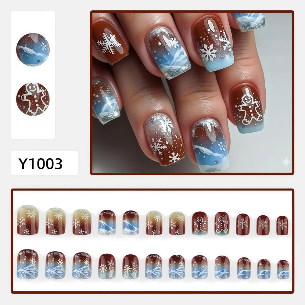 Artificial nails with festive snowflake and gingerbread motif Acalora