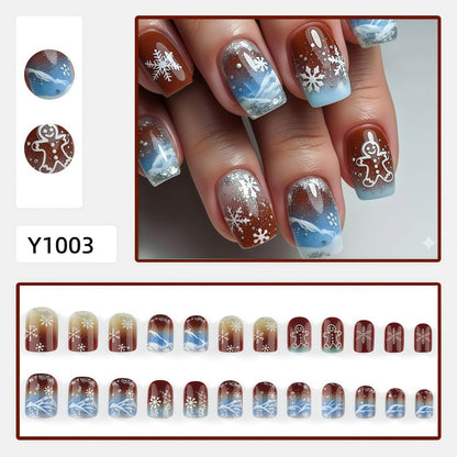 Artificial nails with festive snowflake and gingerbread motif Acalora