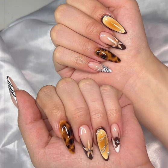 Artificial nails with elegant droplet and animal designs Acalora