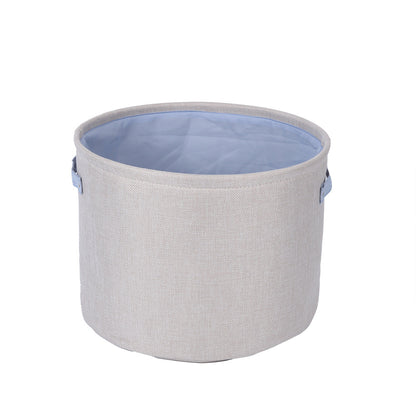 Organizer basket with practical handle and water-repellent inner coating