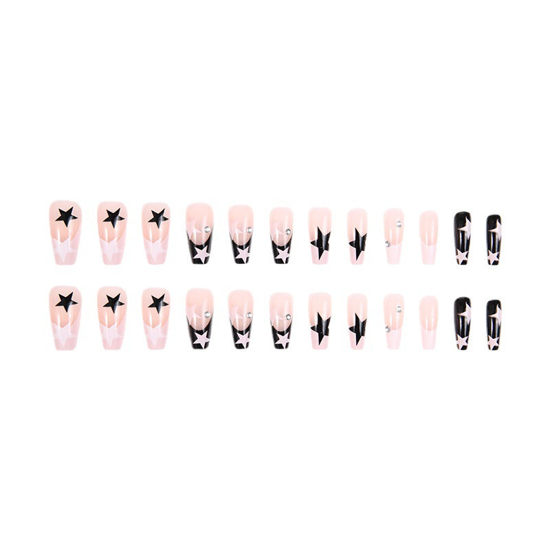 Artificial nail set with glamorous star design and sparkling accents Acalora