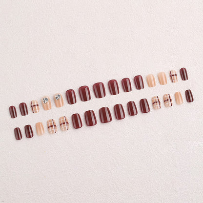 Artificial nail set with elegant, shimmering design and creative accents Acalora