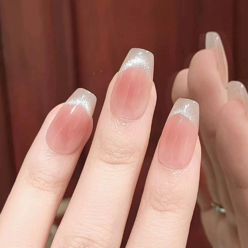 Nail set with elegant French design and sparkling accents Acalora
