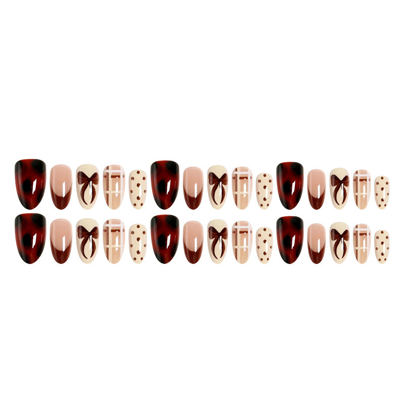 Artificial nail set with elegant bow and caramel designs Acalora