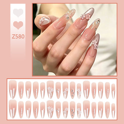 Nail art set with floral 3D applications and glitter accents Acalora