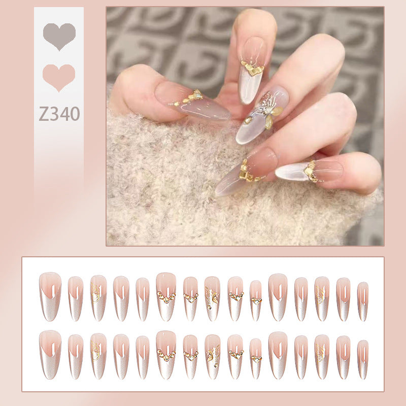 Glamorous art nails with elegant golden details Acalora