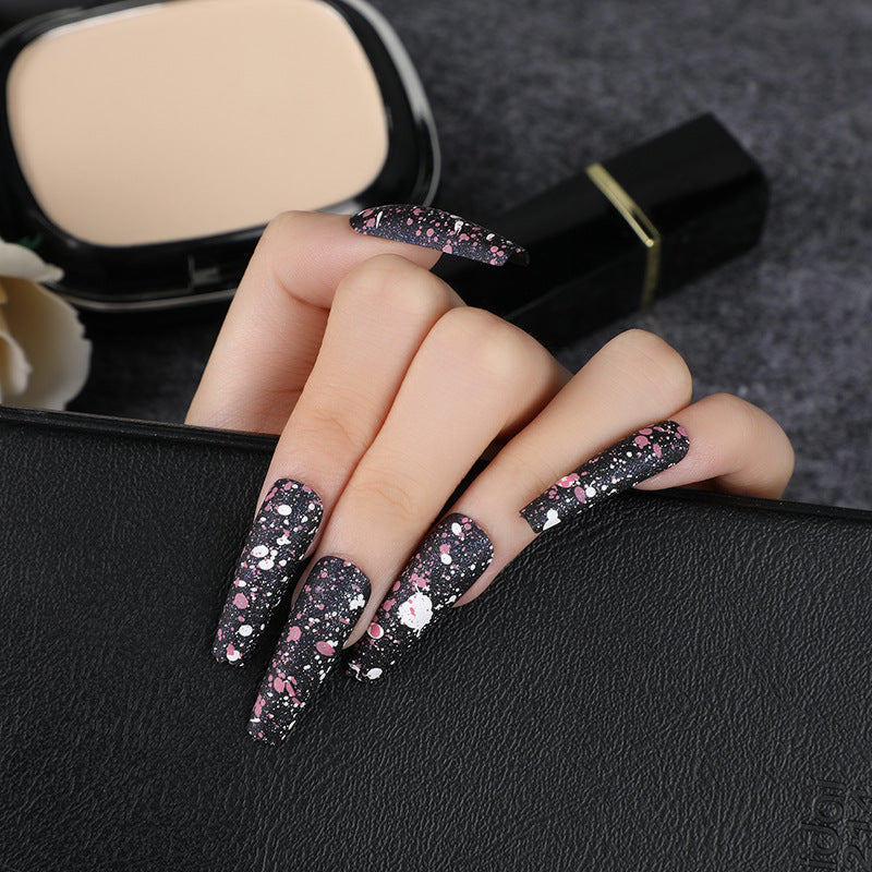 Artistic splatter design artificial nails Acalora