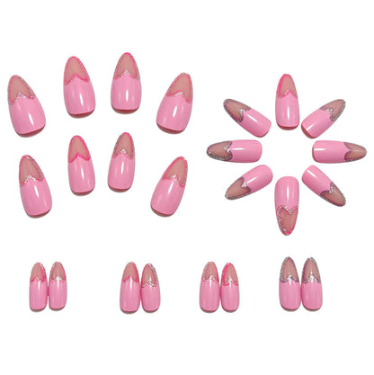 Art nails with heart design and glitter accents Acalora