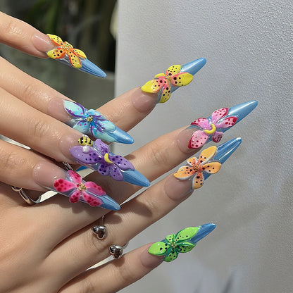 Artificial nails in a playful flower design with glittering accents Acalora