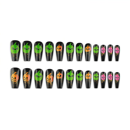 Halloween-style artificial nails with graphic pumpkin designs Acalora