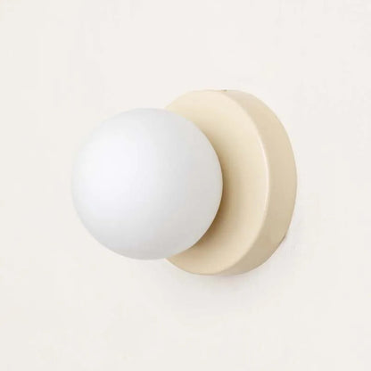 LumiGlobe – Modern wall light with glass block in Mid-Century style