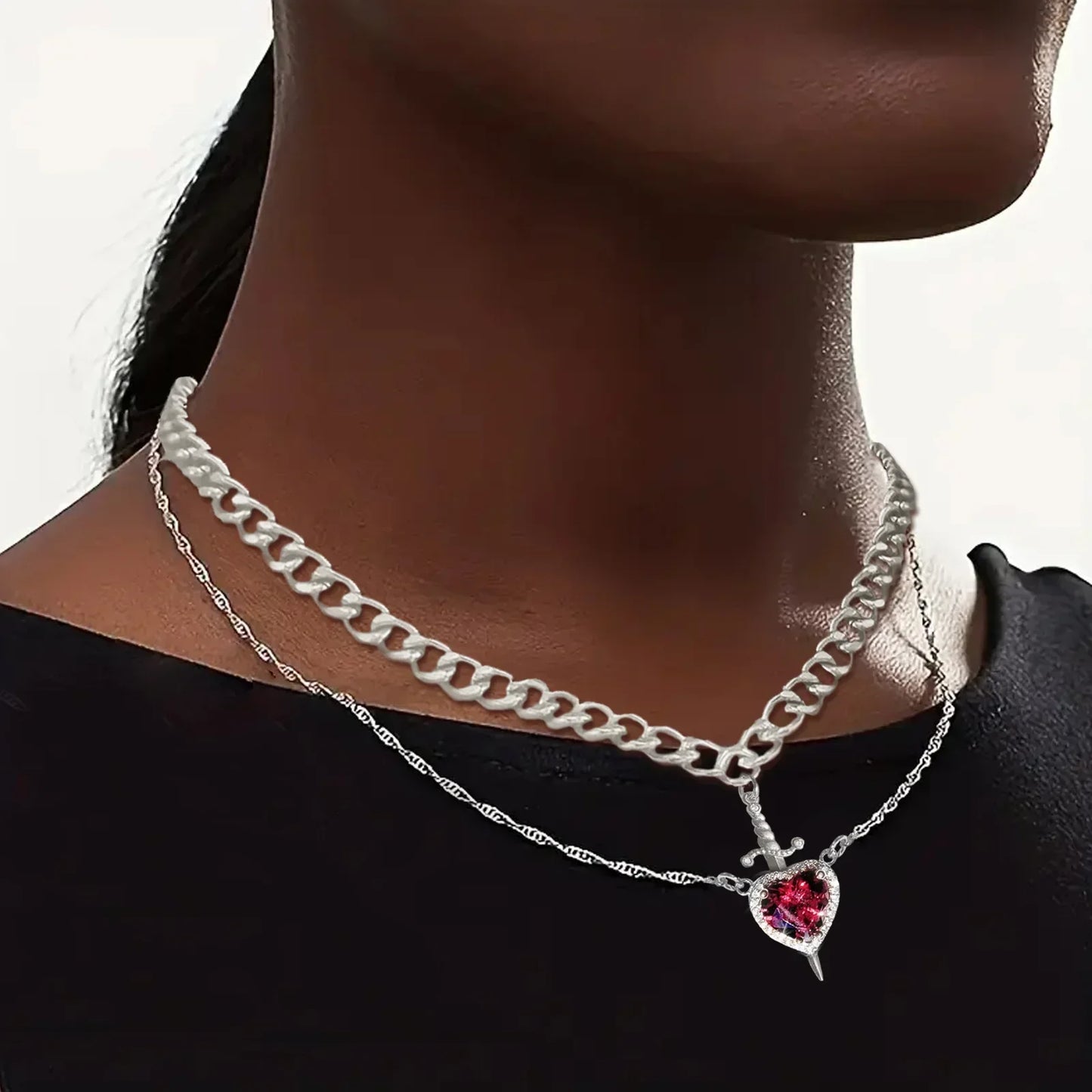 Skanto | Heart and Sword Couple Necklaces