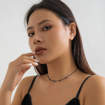 Skanto | Delicate Black Spaced Beads Necklace