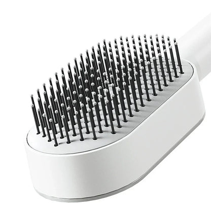 Self-cleaning 3D hairbrush