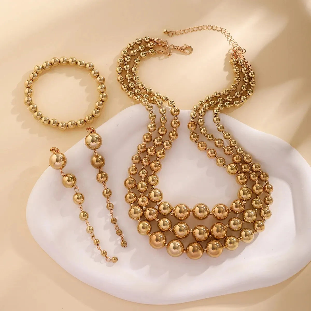 BowLift | Bold Triple Stack Dangle Earrings, Necklace, Bracelet Set