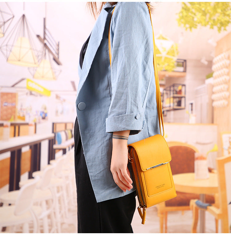 Skanto | Multiclutch | The Multifunctional Touchscreen Bag