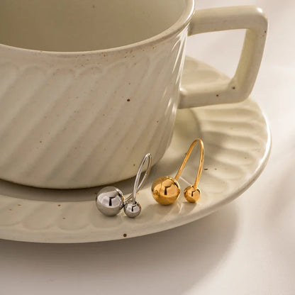 Skanto | 18k Bold Two Ball Open Ring
