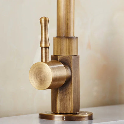 Skanto | Elegant Swan Neck Kitchen Faucet in Antique Brass