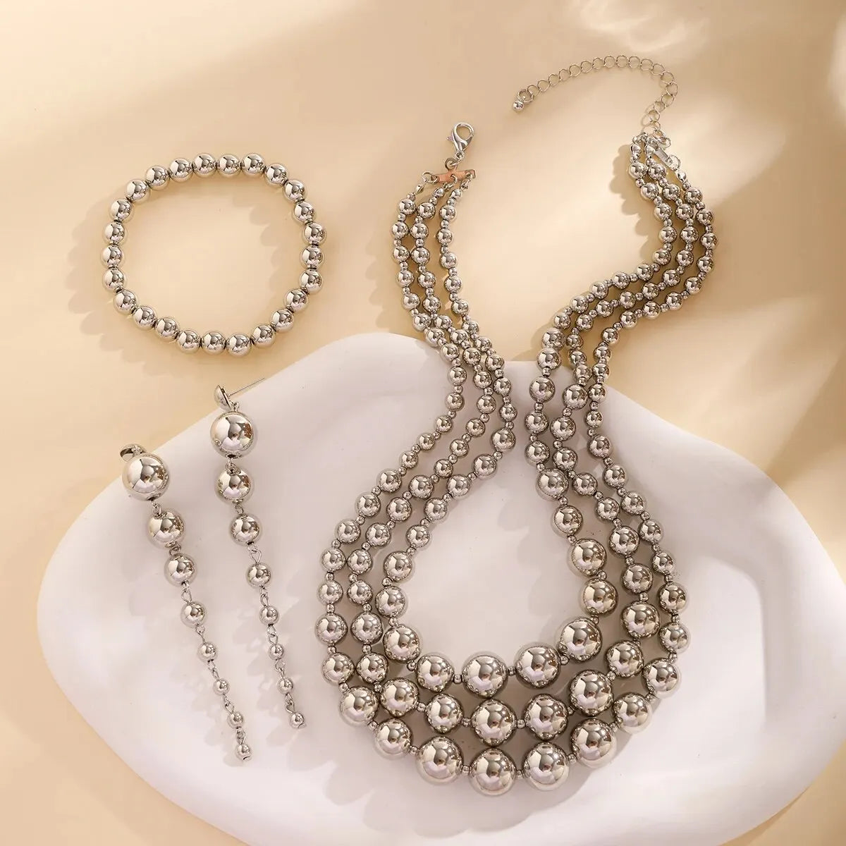 BowLift | Bold Triple Stack Dangle Earrings, Necklace, Bracelet Set