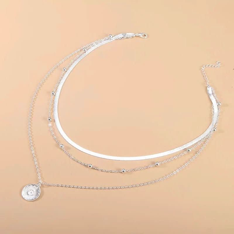 Skanto | Elegant Silver Triple Necklace for Style and Confidence