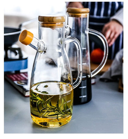 Transparent glass oil bottle with handle | Kalsten